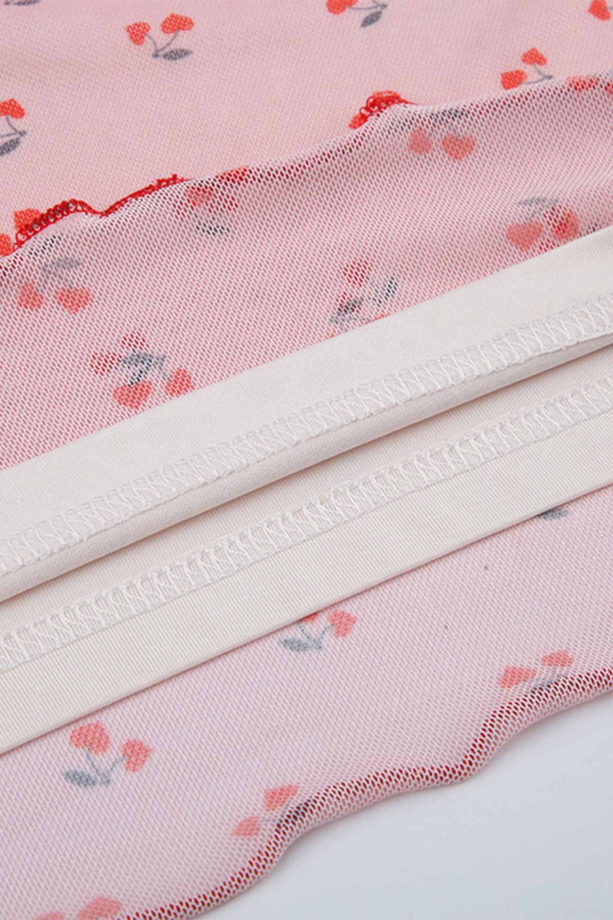 Arolora cherry-printed-mesh-mini-skirt